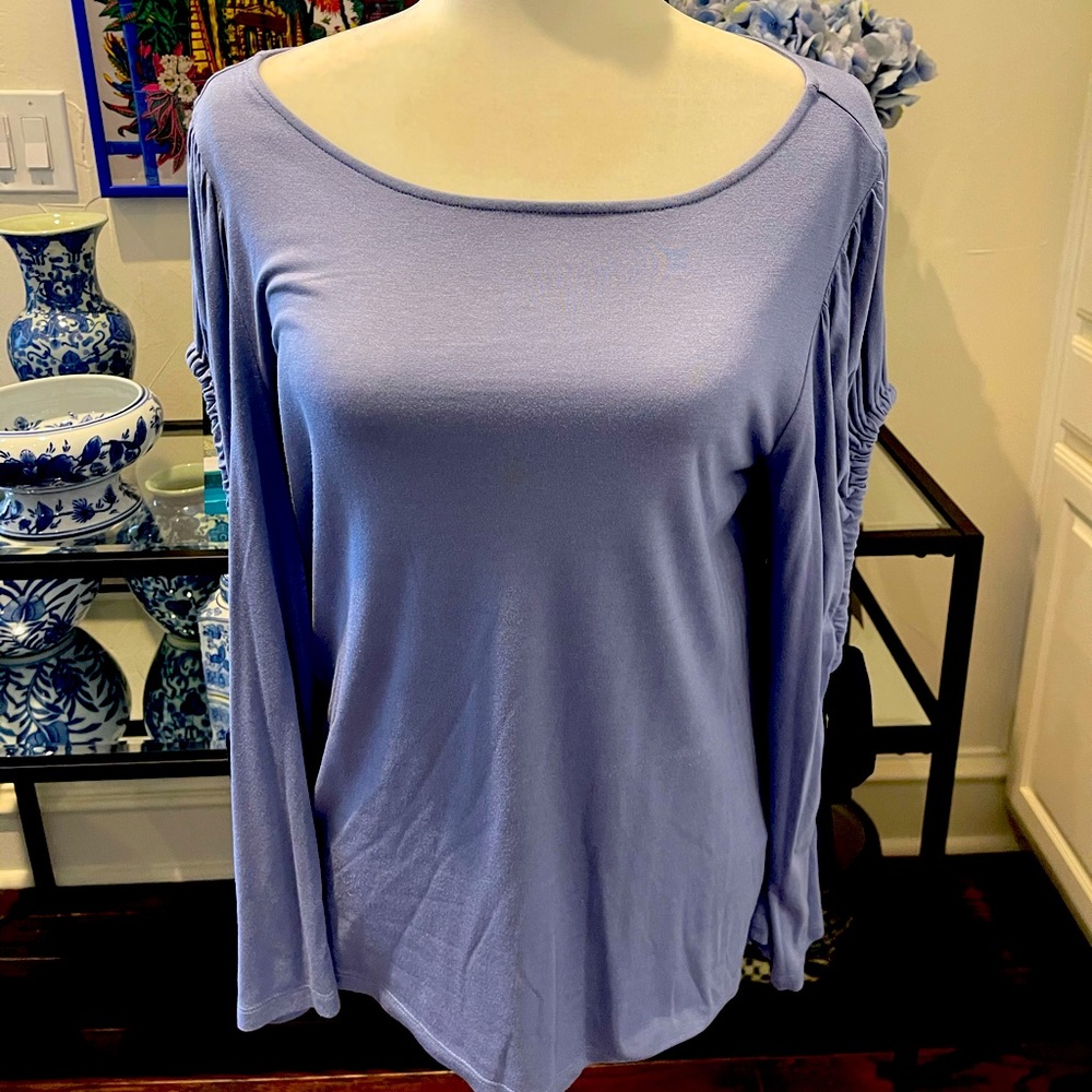 Blue top with cut out sleeves. Size medium
